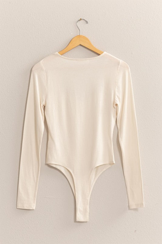Cream body suit